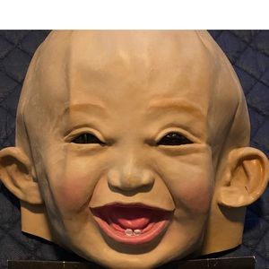 NWOT BABY LATEX MASK